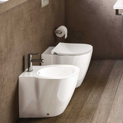 Ambiente inodoro y bidé a suelo para cisterna empotrada CONNECT con asiento tapa normal de Ideal Standard